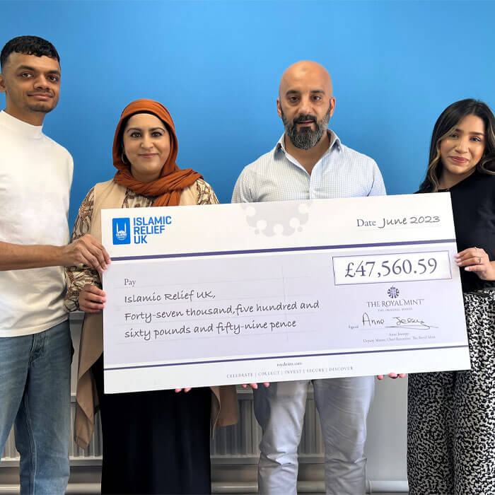 The Royal Mint presents cheque for £47,000 to charity Islamic Relief from sale of Kaaba gold bars 