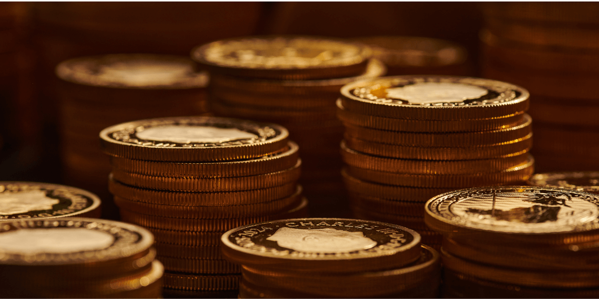 Stacks of gold bullion coins.